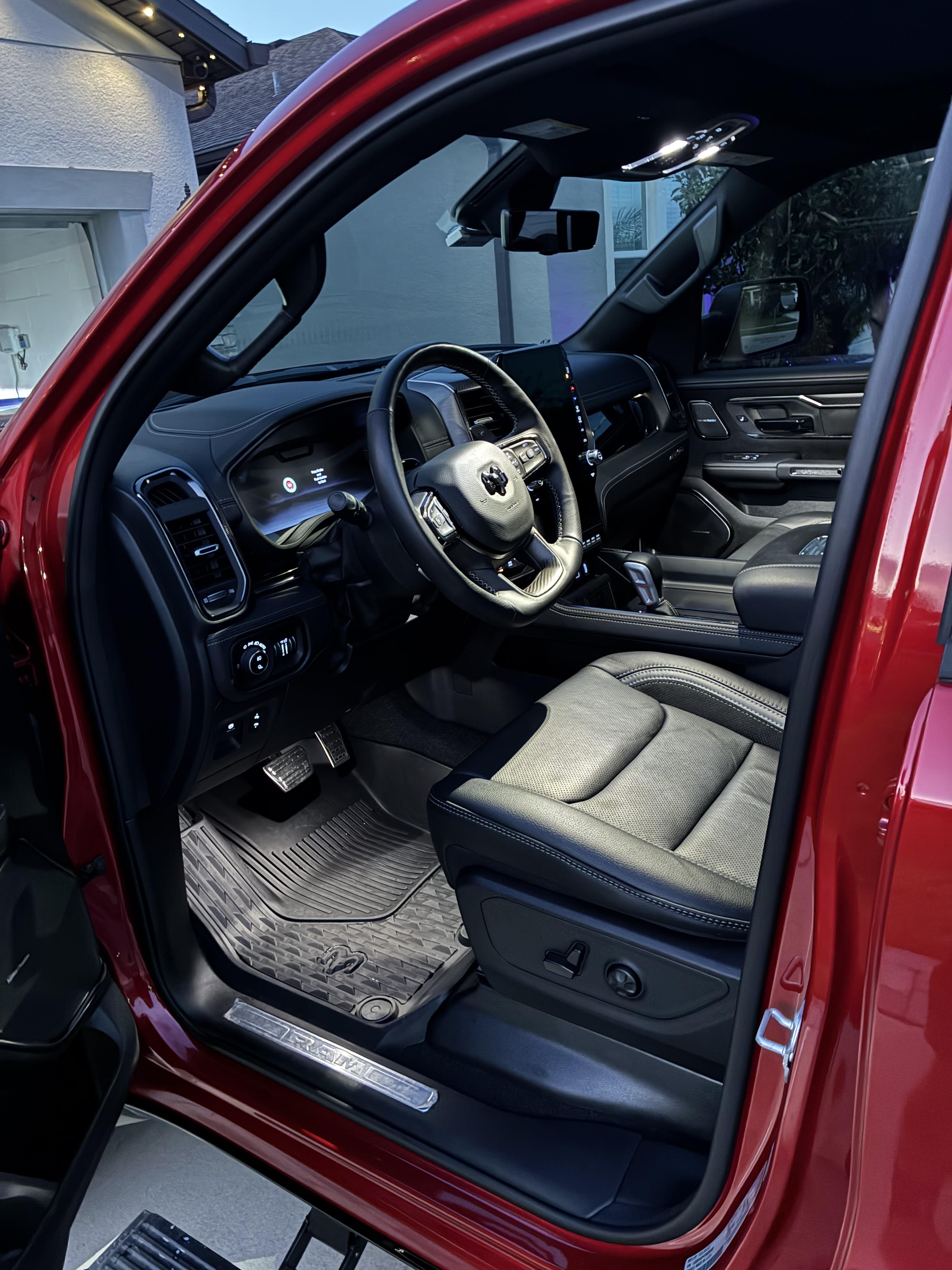 Cleaned leather seats, wood trim and detailed door panel inside a white Mercedes-Maybach GLS SUV