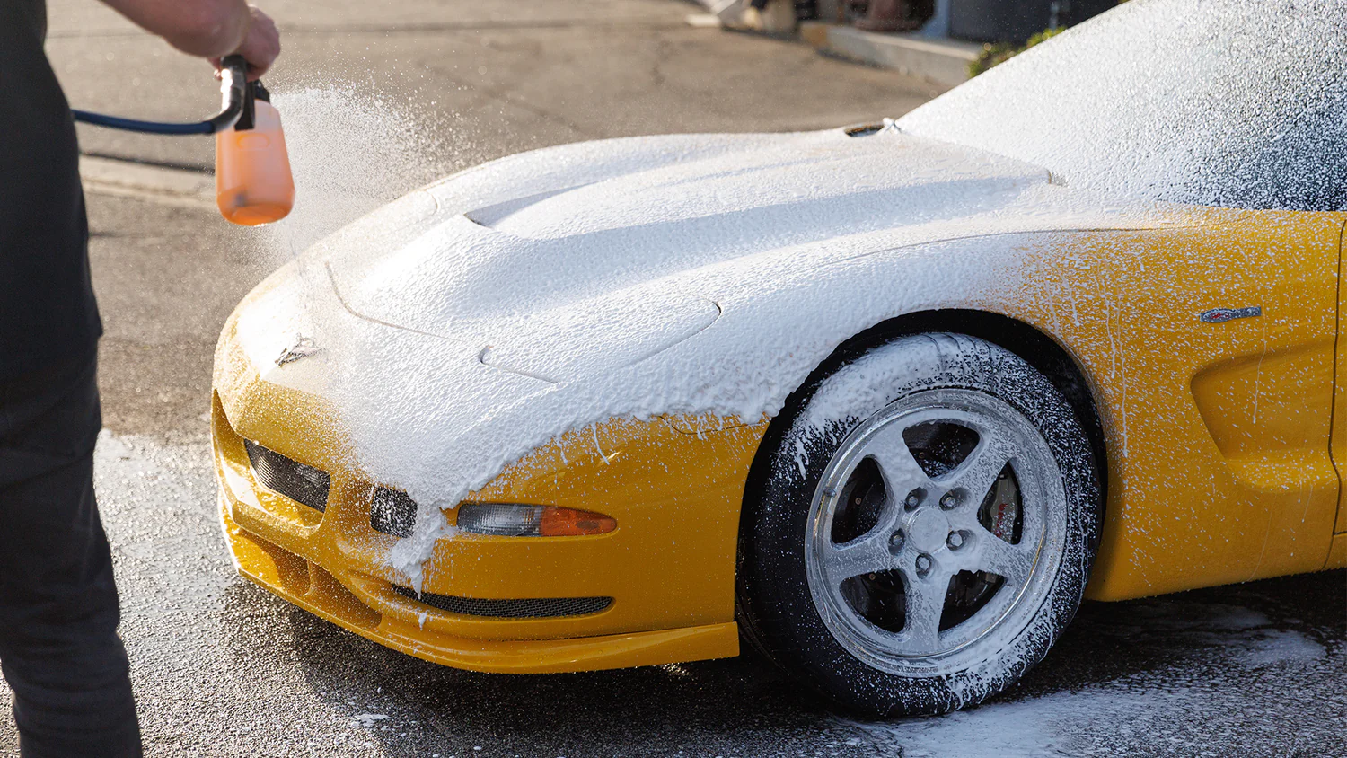 Yellow Corvette snow foam